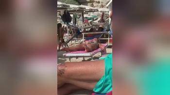 video of Girl has an itch on the beach