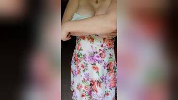 video of Undressing her flower dress