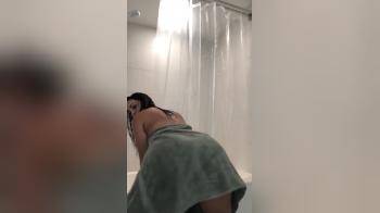 video of shaking her ass with towel flashing her tight pussy