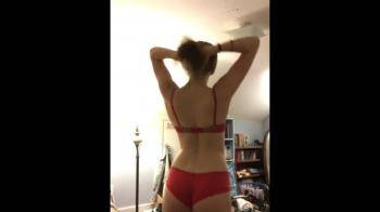 video of hot brunette strips on cam