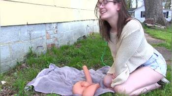 video of exhibitionist fucks dildo naked outdoors