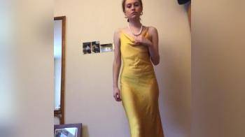 video of Girl dancing in yellow dress