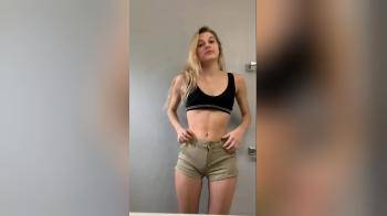 video of Blonde Stripping In Bathroom