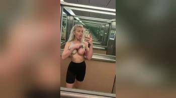 video of Blonde flashes her implants in elevator