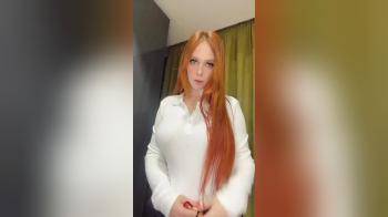 video of Gorgeous redhead reveals big tits