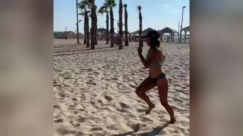 video of Fitgirl on the beach