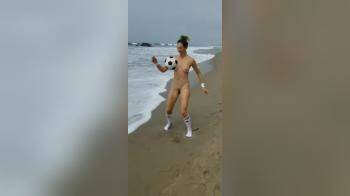 video of Juggling a soccer ball at the beach