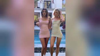 video of 2 gorgeous girls showing off in short dresses