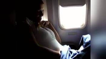 video of Frigging her pussy on plane