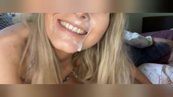 video of hot facialized blonde smiles for the camera
