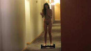 video of Naked Fun Shaved Pussy MILF Learns to Ride a Hoverboard.