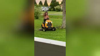 video of Mowing the lawn topless