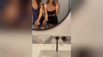 video of Two hotties show off in front of the mirror