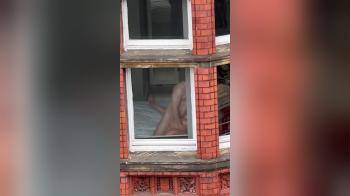 video of Couple filmed fucking through window