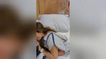 video of Girl in hospital giving a quick blowjob while laying in her bed