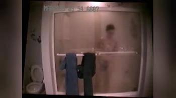 video of Shower voyeur with a handy at the end