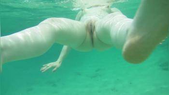 video of she is an expert at swimming nude