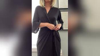 video of blonde milf opens robe to reveal a great body
