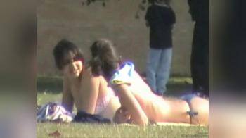 video of tanning topless on campus