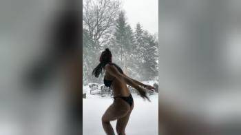 video of bikini in the snow