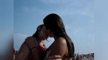 video of 2 girls kissing at beach