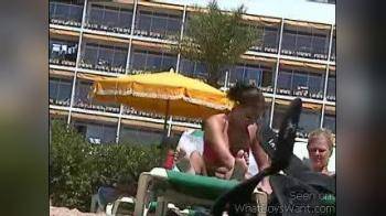 video of Topless in lounge chair