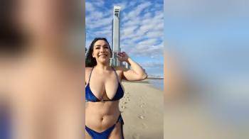 video of Big tits flashing at the beach