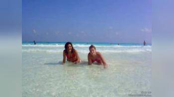 video of 2 girls in bikinis at beach mov00054
