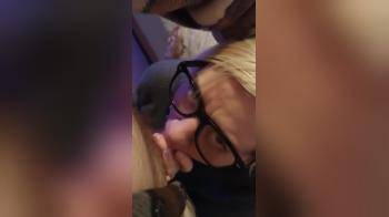 video of Tattooed blonde in glasses gets a facial