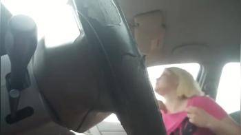 video of Blonde sucks and swallows black dick in the car