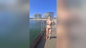 video of Big tits jumping into the sea