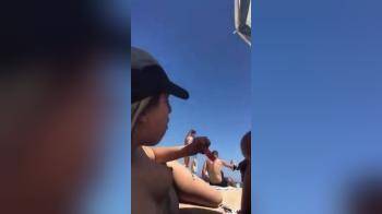 video of flashing boobs at the beach