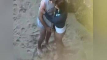 video of Horny Teen Couple Gets Busted Fucking In Public On A Beach
