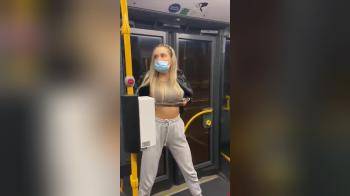 video of masked girl flashing on bus