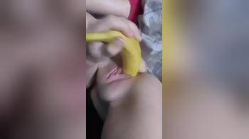 video of Stuffing Her Pussy With Long Banana