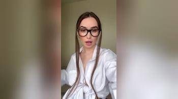 video of White top black skirt