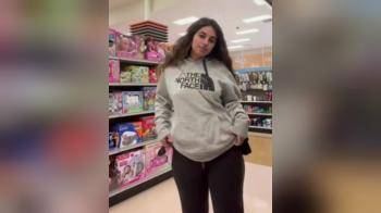 video of pops her titties out in the store