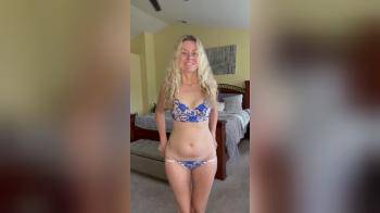 video of Blonde MILF gets undressed