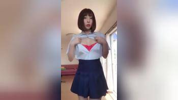 video of Japanese hottie slowly strips