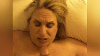 video of Mature blonde gets a messy cum facial and then slurps it all up