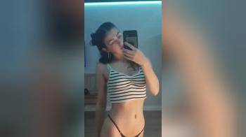video of cute babe filming herself in the mirror