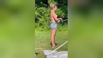 video of Milf in tiny bikini showing off