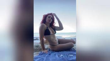 video of bikini hottie on the beach