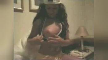 video of enjoying her own boobs