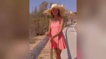 video of Sexy skinny girl in pink dress flashing in public