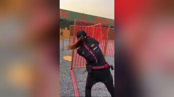 video of Sexy lady firing rifle on gun course