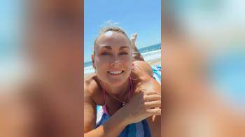 video of beach day with thick blonde