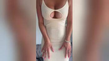 video of Taking off her dress