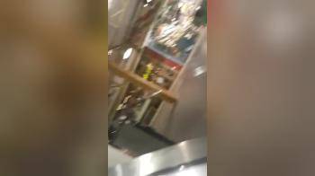 video of Upskirt action on escalator with beauty