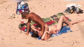 video of beach mouth fuck by tanned nudist couple